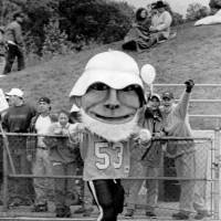 Louie the Laker on the football field.